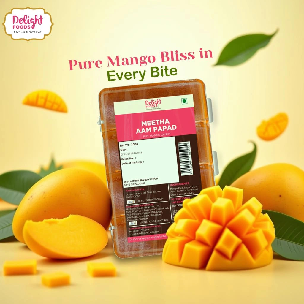 Packaged MEETHA AAM PAPAD with mangoes on a yellow background