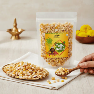 Yellu Bella snack package with snacks on a plate and spoon, on a neutral background