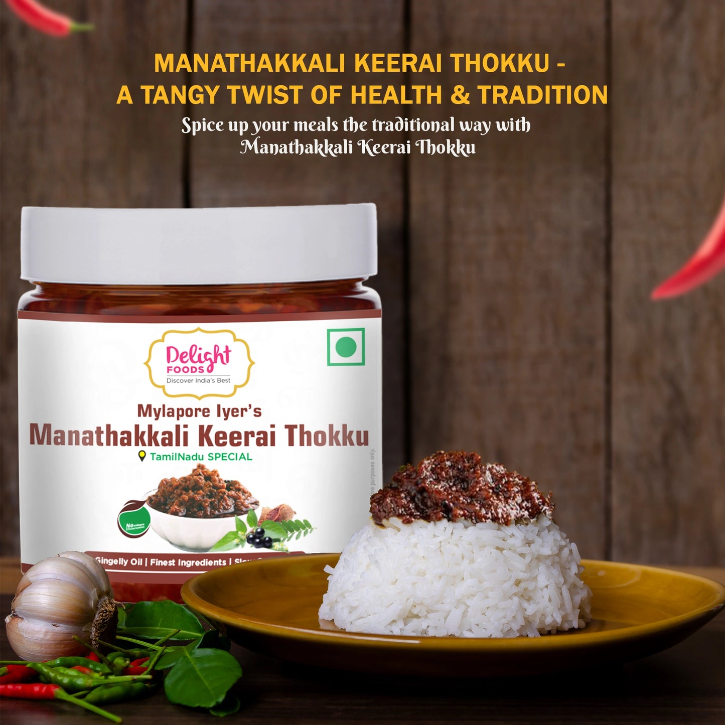 Jar of Manathakkali Keerai Thokku with a plate of rice and garnishes on a wooden background
