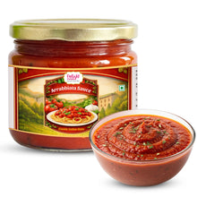Jar of Arrabiata Sauce with a bowl of sauce on a white background